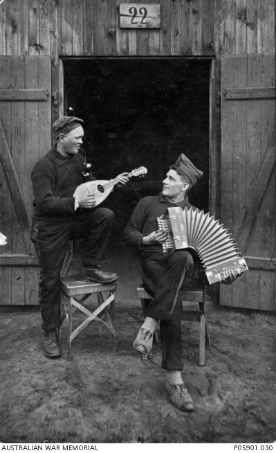 Allied prisoners of war playing musical instruments at a German POW camp